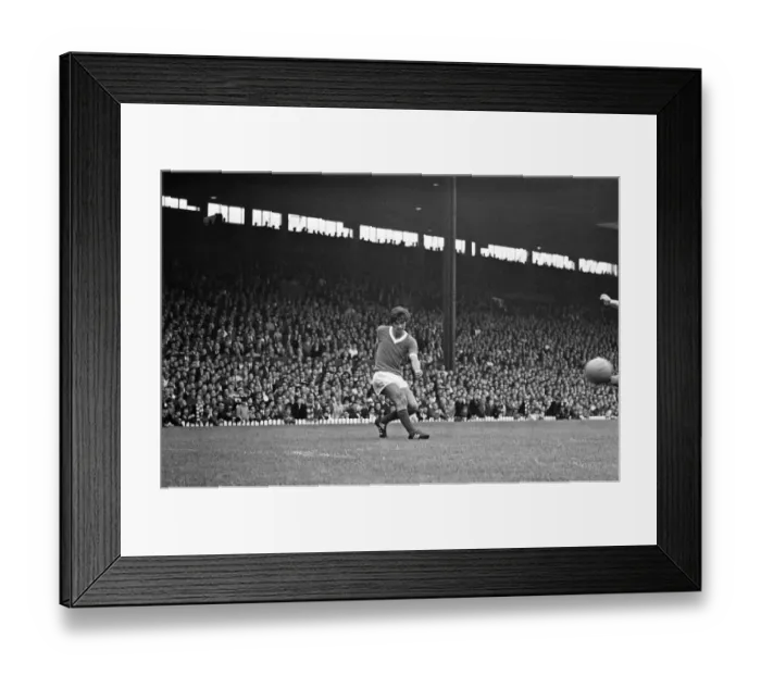 Framed Print : Manchester United footballer George Best in action against Leicester City during