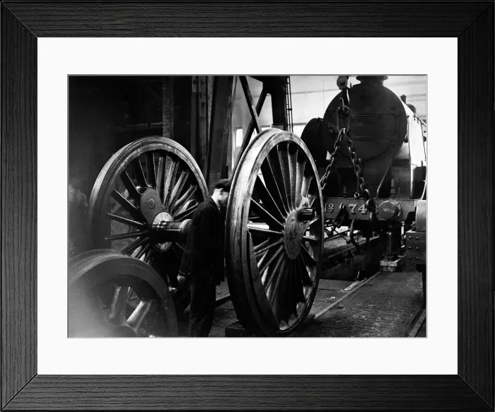 Framed Print : Locomotive wheels seen here under going maintenance at the Southern Railways engine shed Framed Print : Locomotive wheels seen here under going maintenance at the Southern Railways engine shed