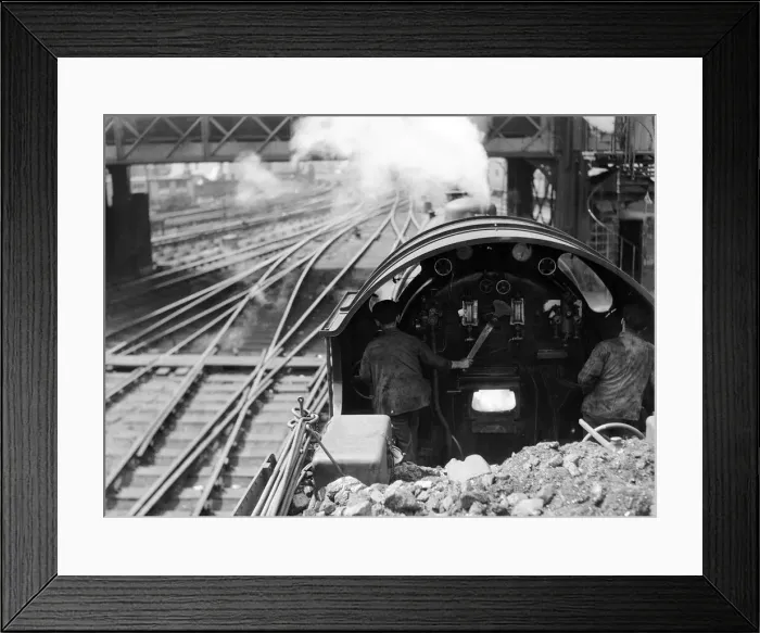 Framed Print : View over the cab of a Southern railways express train making its way from Waterloo to