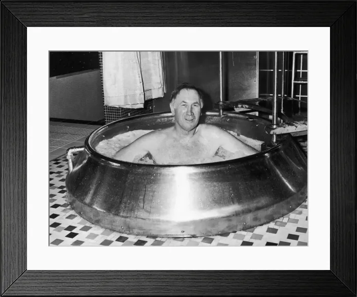Framed Print : Joe Mercer the Manchester City manager seen here soaking in a tub at Blackpool sauna bath