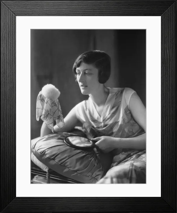 Framed Print : Mannequin seen here applying powder before a fashion shoot for the latest 1932 fashions Framed Print : Mannequin seen here applying powder before a fashion shoot for the latest 1932 fashions