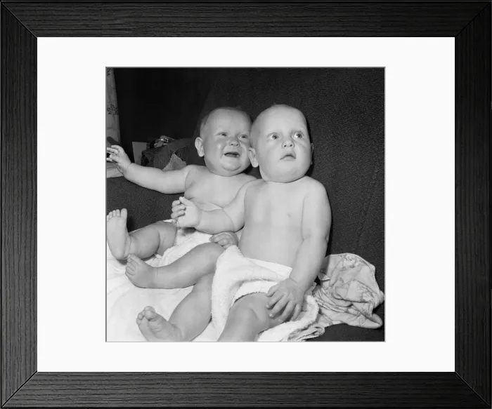 Framed Print : Twins Ian and Robert Kearns who both weighed eight pounds two ounces when they were born