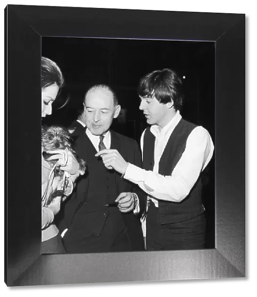 Paul McCartney with father Jim McCartney and actress Magda Konopka