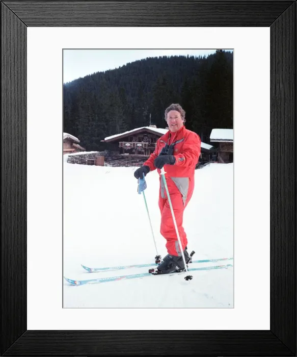 Framed Print : James Whitaker Daily Mirror Royal Correspondent seen here on skis whilst reporting