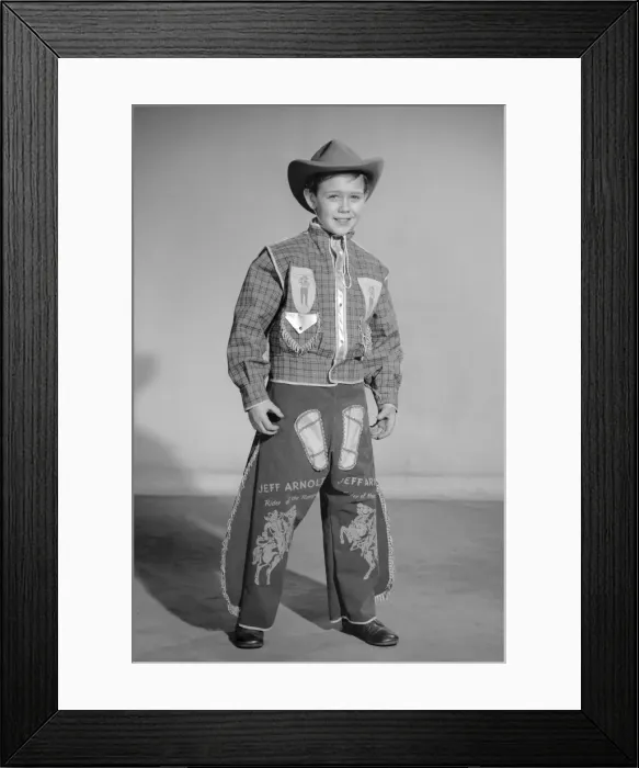 Framed Print : Boy dressed as cowboy Jeff Arnold for a Reveille feature on dressing up 2nd December Framed Print : Boy dressed as cowboy Jeff Arnold for a Reveille feature on dressing up 2nd December