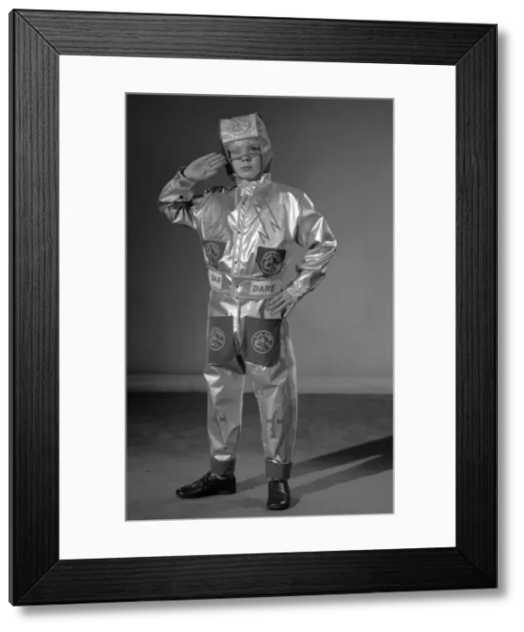 Framed Print : Boy dressed as Dan Dare astronaut for a Reveille feature on dressing up 2nd December