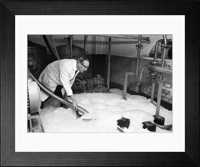Framed Print : A workmant at Ansells Brewery in Birmingham, pouring half a million pints of Pale Ale Framed Print : A workmant at Ansells Brewery in Birmingham, pouring half a million pints of Pale Ale