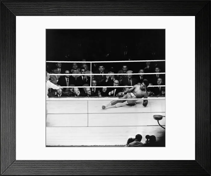 Framed Print : Action during the non-title heavyweight fight between American Cassius Clay Framed Print : Action during the non-title heavyweight fight between American Cassius Clay