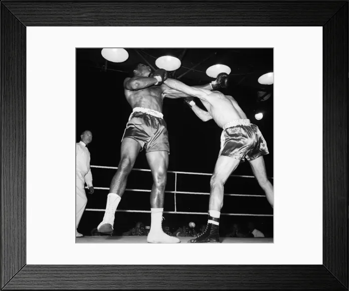 Framed Print : Action during the non-title heavyweight fight between American Cassius Clay Framed Print : Action during the non-title heavyweight fight between American Cassius Clay