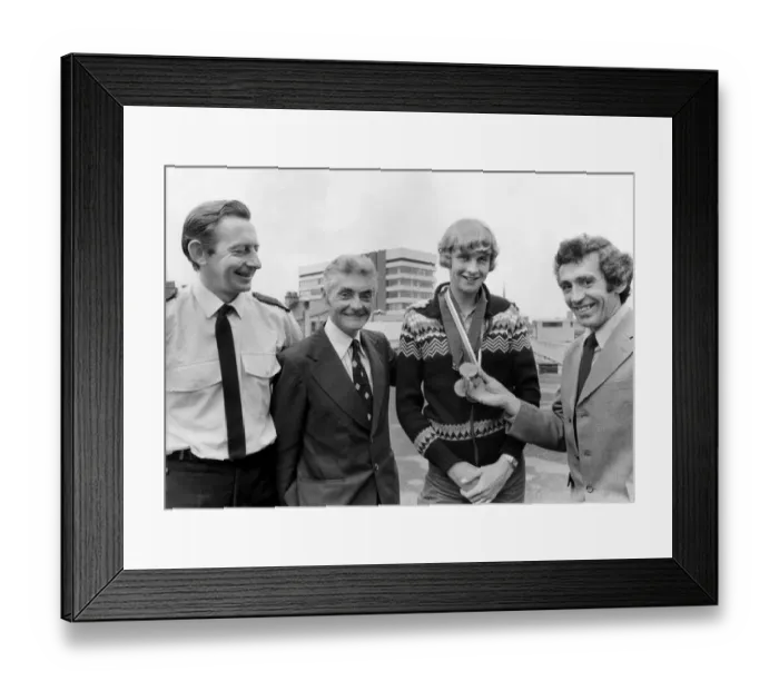 Framed Print : Athlete Steve Cram Steve Cram wear Jim Alders medals watched by
