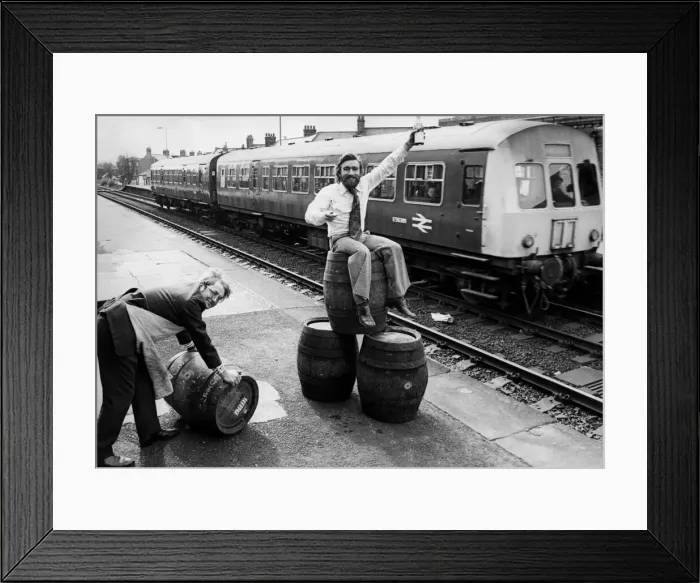 Framed Print : Peter Gill (pushing barrel) and Dave Young (sitting on barrels Framed Print : Peter Gill (pushing barrel) and Dave Young (sitting on barrels