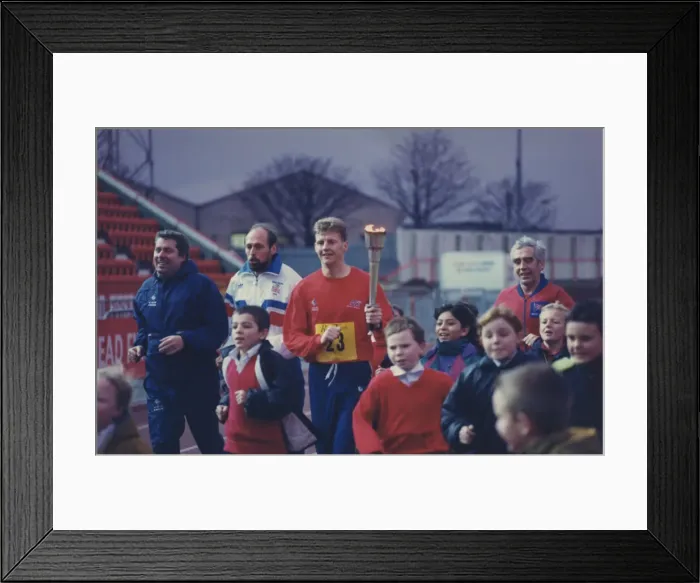 Framed Print : Athlete Steve Cram Steve Cram carrying a torch for Children in Need Framed Print : Athlete Steve Cram Steve Cram carrying a torch for Children in Need