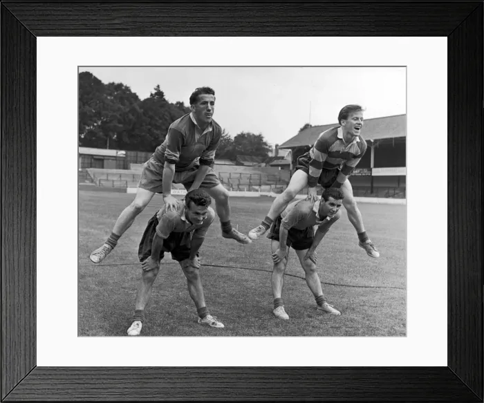 Framed Print : Southampton FC Players Leap frogging are from L2R Bending, Cliff Huxford and Dick Connor
