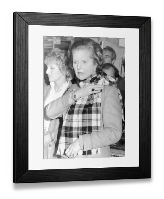 Framed Print : Margaret Thatcher PM tries on a tartan scarf at Elgin, Scotland, June 1983 Framed Print : Margaret Thatcher PM tries on a tartan scarf at Elgin, Scotland, June 1983