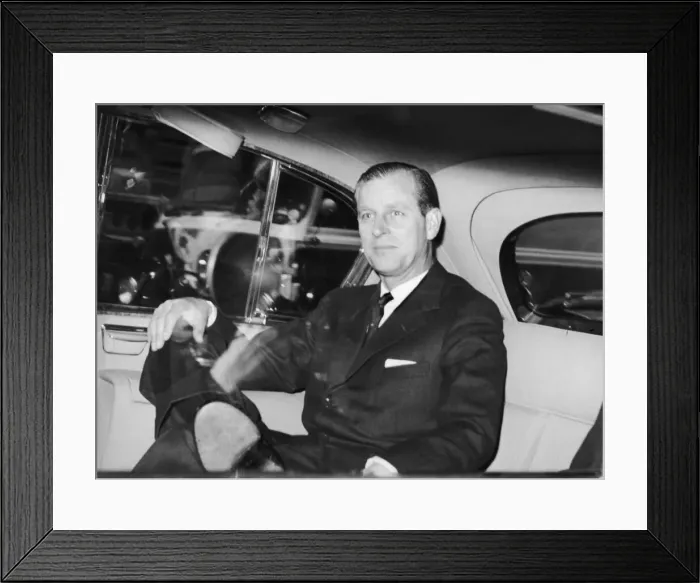Framed Print : Prince Philip, Duke of Edinburgh, pictured in his car as he drives away from the RAG Club Framed Print : Prince Philip, Duke of Edinburgh, pictured in his car as he drives away from the RAG Club