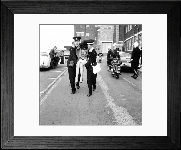 Framed Print : Police try to control fans in the streets of Liverpool before the premiere of The Beatles Framed Print : Police try to control fans in the streets of Liverpool before the premiere of The Beatles