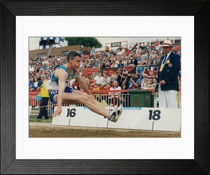 Framed Print : Athlete Jonathan Edwards Jonathan Edwards competing in the Triple Jump event during Framed Print : Athlete Jonathan Edwards Jonathan Edwards competing in the Triple Jump event during