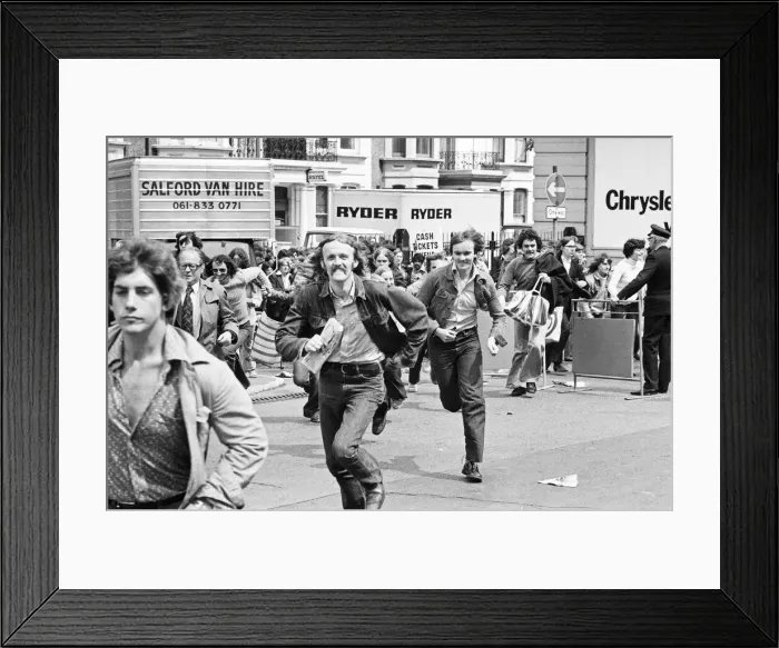 Framed Print : Rolling Stones fans outside Earls Court rushing to get into the concert Framed Print : Rolling Stones fans outside Earls Court rushing to get into the concert