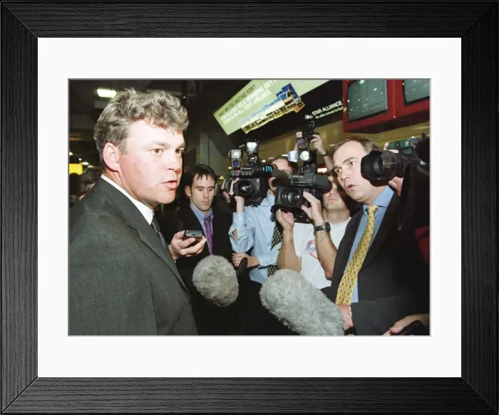 Framed Print : Darren Clarke talks to the press at Heathrow Sept 1999 after the Ryder Cup defeat
