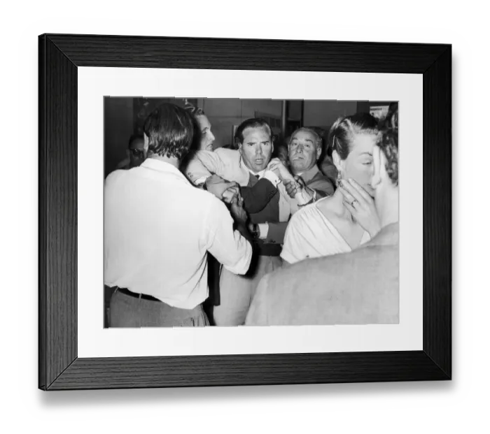 Framed Print : Kevin McClory, film producer, being restrained in bar room brawl with London film critic Framed Print : Kevin McClory, film producer, being restrained in bar room brawl with London film critic