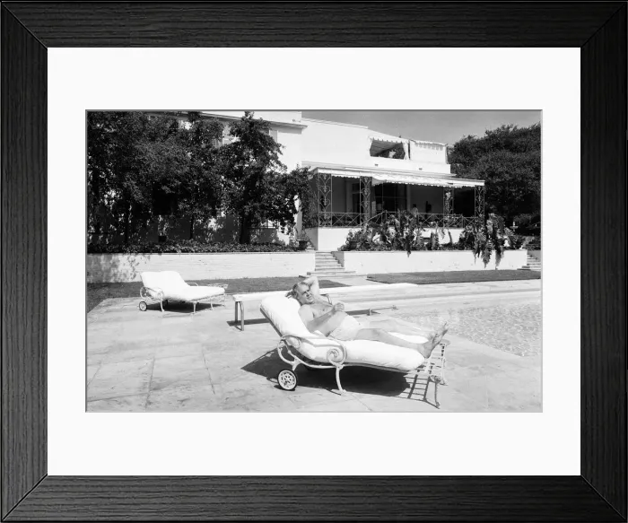 Framed Print : Cubby Broccoli, American film producer, pictured at his Beverley Hills home, California Framed Print : Cubby Broccoli, American film producer, pictured at his Beverley Hills home, California