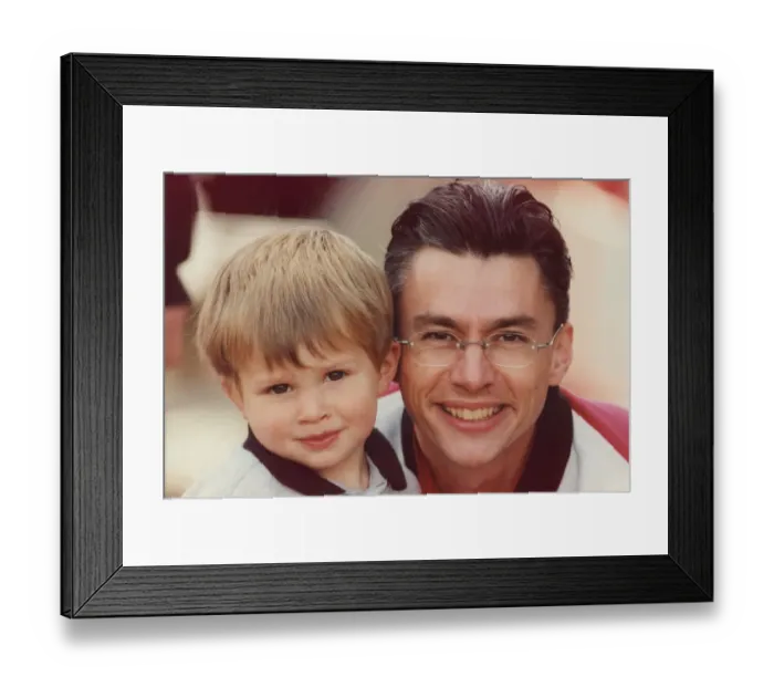 Framed Print : Athlete Jonathan Edwards Jonathan Edwards with his son Nathan 18 July 1998 Framed Print : Athlete Jonathan Edwards Jonathan Edwards with his son Nathan 18 July 1998