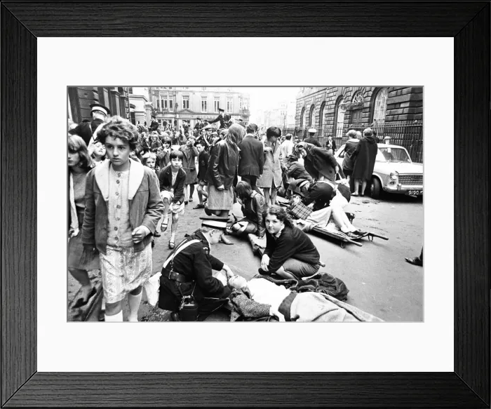Framed Print : Northern Premier of A Hard Days Night'. Fans line up along the streets in Framed Print : Northern Premier of A Hard Days Night'. Fans line up along the streets in