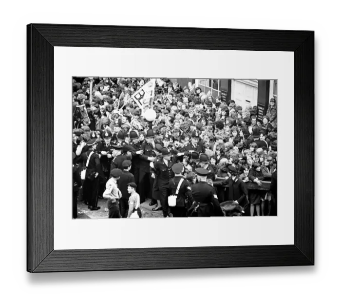 Framed Print : Northern Premier of A Hard Days Night'. Fans line up along the streets in Framed Print : Northern Premier of A Hard Days Night'. Fans line up along the streets in