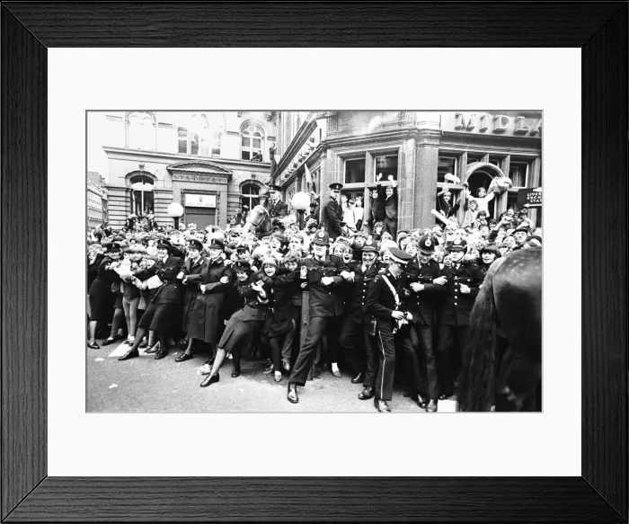 Framed Print : Northern Premier of A Hard Days Night'. Fans line up along the streets in Framed Print : Northern Premier of A Hard Days Night'. Fans line up along the streets in