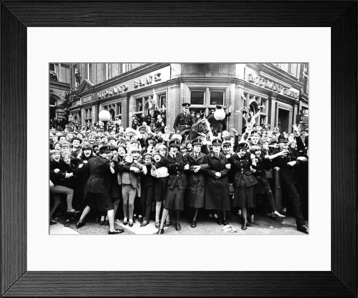 Framed Print : Northern Premier of A Hard Days Night'. Fans line up along the streets in Framed Print : Northern Premier of A Hard Days Night'. Fans line up along the streets in