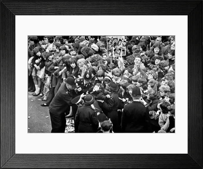 Framed Print : Northern Premier of A Hard Days Night'. Fans line up along the streets in Framed Print : Northern Premier of A Hard Days Night'. Fans line up along the streets in