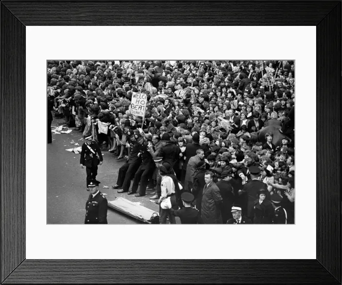Framed Print : Northern Premier of A Hard Days Night'. Fans line up along the streets in Framed Print : Northern Premier of A Hard Days Night'. Fans line up along the streets in