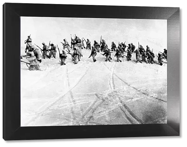 Italian troops advance at 3000 metres on a mountain outpost in the Izonzo district