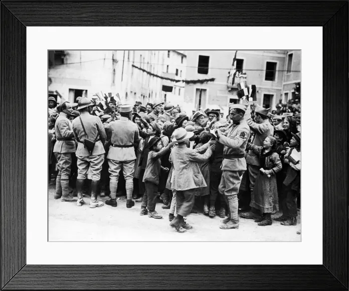 Framed Print : Soldiers of the French forces operating in Italy distributing French flags to Framed Print : Soldiers of the French forces operating in Italy distributing French flags to