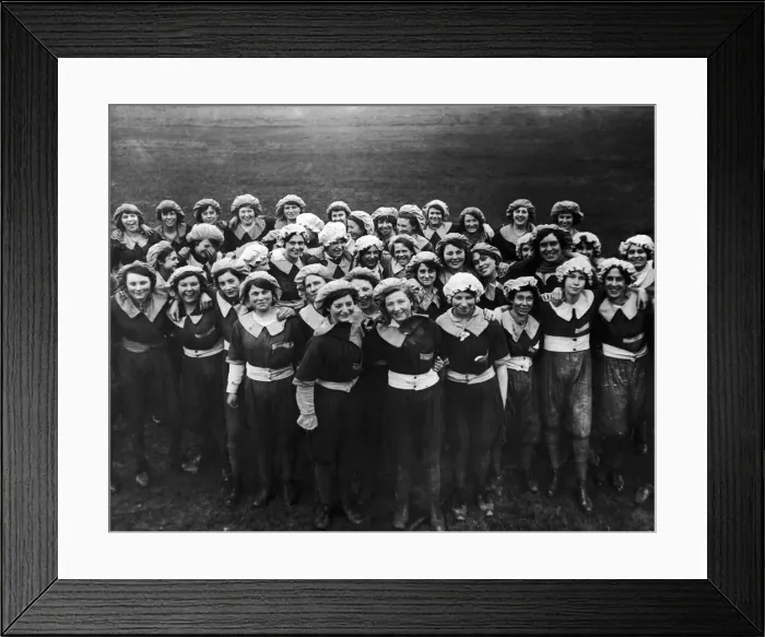 Framed Print : Munitions girls seen here posing for the camera after their daily physical exercises