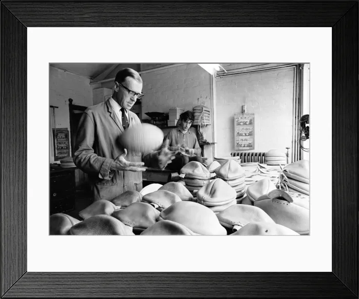 Framed Print : Quality Control inspection at the Gilbert Rugby Ball factory 1st September 1966 Framed Print : Quality Control inspection at the Gilbert Rugby Ball factory 1st September 1966