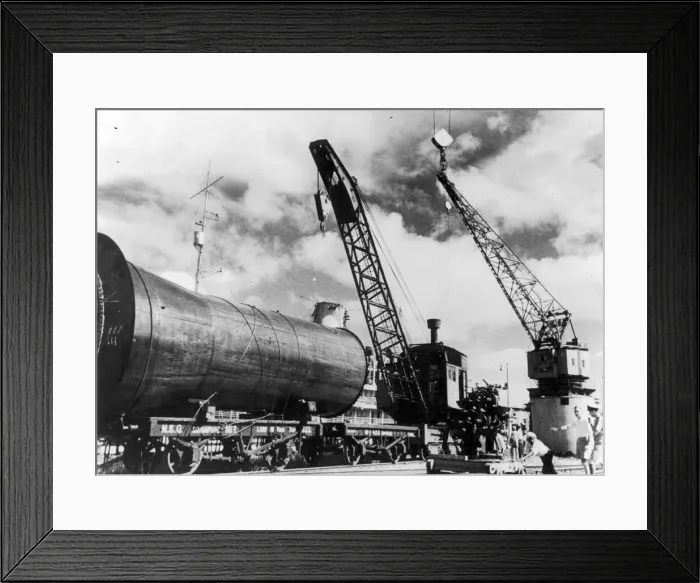 Framed Print : The Singapore Naval base showing vessels refitting or in dock during the Second World War Framed Print : The Singapore Naval base showing vessels refitting or in dock during the Second World War