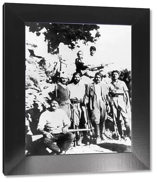Greek guerialla fighters in the mountains of Crete wearing the traditional headdress
