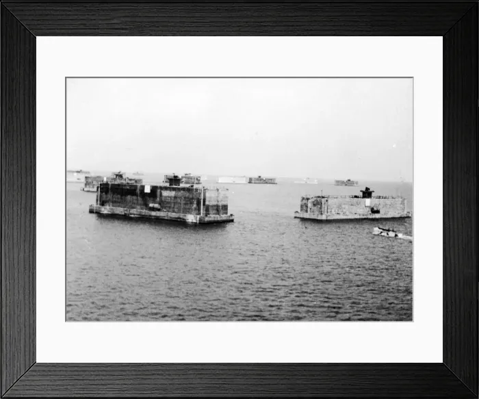 Framed Print : Pre-fabricated ports set down at Mulberry Harbour off the coast of Normandy built to aid Framed Print : Pre-fabricated ports set down at Mulberry Harbour off the coast of Normandy built to aid
