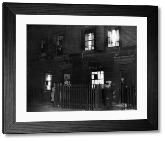 Framed Print : A family posing outside their home in Cab; e Street, Mile End London during a dim-out Framed Print : A family posing outside their home in Cab; e Street, Mile End London during a dim-out