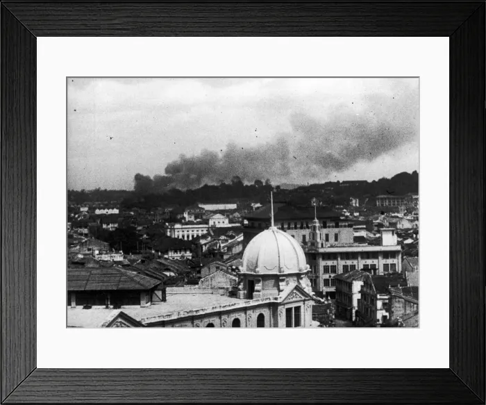 Framed Print : Last days of Singapore. A picture showing smoke rising over Singapore during a Japanese Framed Print : Last days of Singapore. A picture showing smoke rising over Singapore during a Japanese