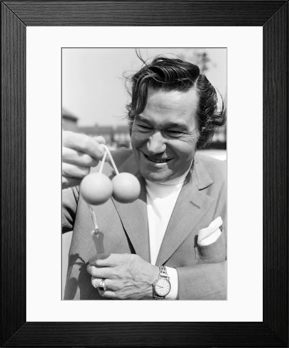 Framed Print : Actor, Reg Varney photo-call playing with new game Ker Knockers, at Wembley Framed Print : Actor, Reg Varney photo-call playing with new game Ker Knockers, at Wembley