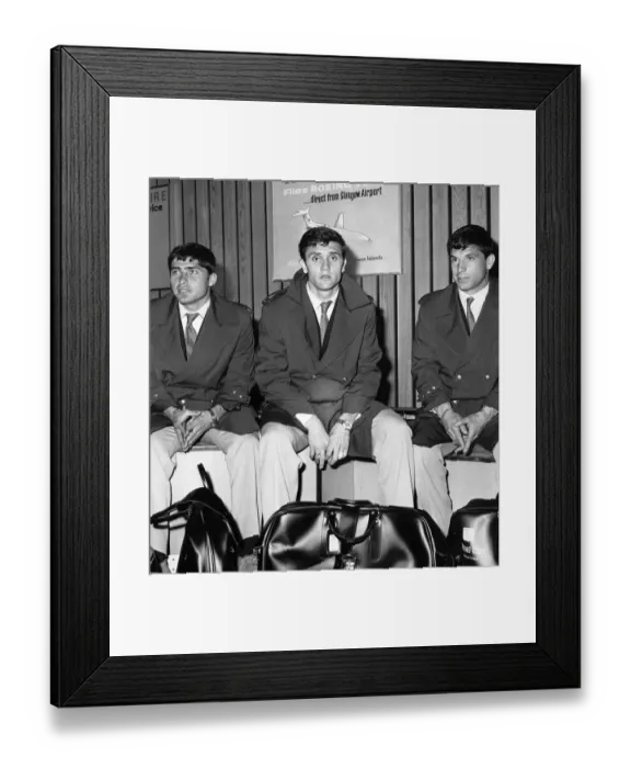 Framed Print : Racing Club of Argentina players waiting for their luggage at the airport as they land in Framed Print : Racing Club of Argentina players waiting for their luggage at the airport as they land in