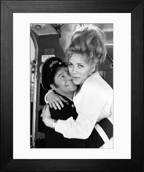 Framed Print : On The Buses, filmset. 10th March 1971. Actor Reg Varney aka Stan Butler the bus