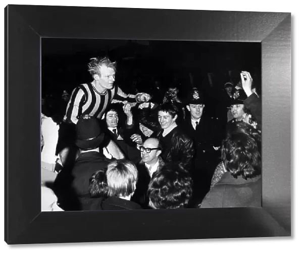 Gordon Haig carried shoulder high by fans January 1967