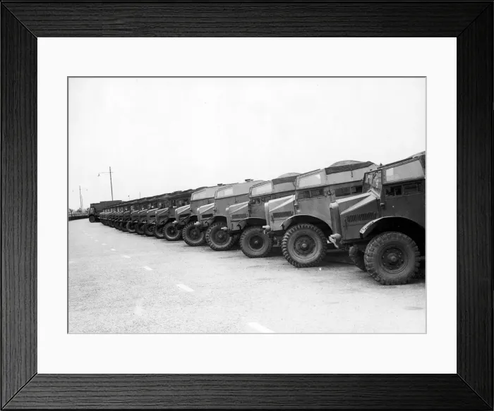 Framed Print : PArt of a long line of army vehicles which stretch for over a mile