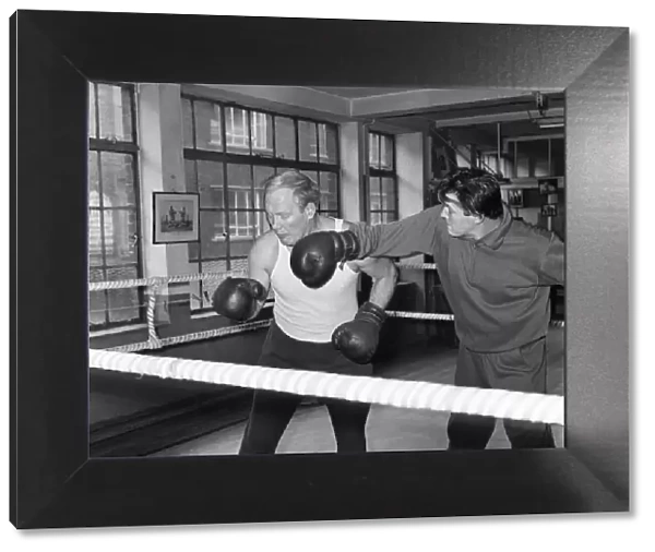 Roger Moore The Saint and Nosher Powell, sparring together