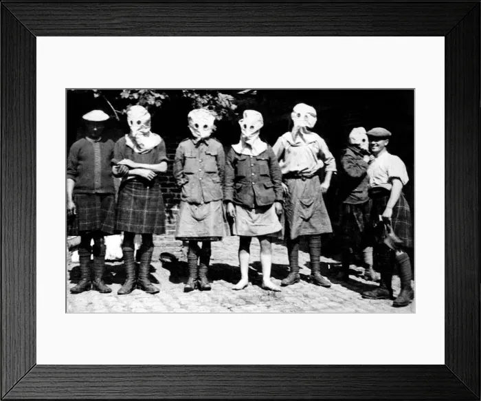 Framed Print : Just behind the British frontline. Men of the Scottish regiment get use to wearing their