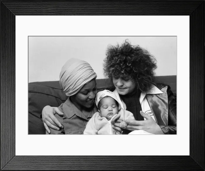Framed Print : Marc Bolan with girlfriend Gloria Jones and their baby son Framed Print : Marc Bolan with girlfriend Gloria Jones and their baby son