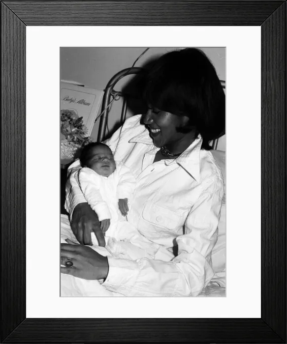 Framed Print : Marc Bolan with girlfriend Gloria Jones and their baby son Framed Print : Marc Bolan with girlfriend Gloria Jones and their baby son